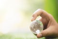 Close up of Green Planet in Your Hands. Save Earth. Royalty Free Stock Photo