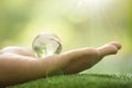 Close up of Green Planet in Your Hands. Save Earth. Royalty Free Stock Photo
