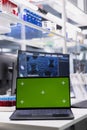 Close up of green screen laptop and computer program displaying DNA data Royalty Free Stock Photo