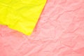 Close up of Green Yellow and Pink color wrinkle crumpled old with paper page texture rough background. crease grunge parchment pat Royalty Free Stock Photo