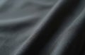 Close-up of grey cotton jersey fabric texture. Soft knit material displays subtle marl pattern, heathered appearance. Textile Royalty Free Stock Photo