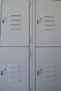 Close up of grey metal lockers for personal items storage Royalty Free Stock Photo