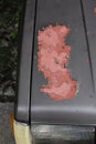 Close-up a grey old car bonnet with crack and scratch colour skin. Royalty Free Stock Photo