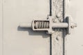 Close up of Grey Pained Metal Spring Door Handle