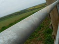 Detail of metal pole on a gate in the countryside Royalty Free Stock Photo