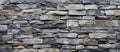 Close up of a grey stone wall with intricate brickwork pattern Royalty Free Stock Photo