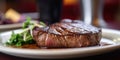 Close-up of a grilled steak on a plate Royalty Free Stock Photo