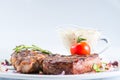 close-up grilled steak at a white plate Royalty Free Stock Photo