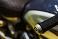 Close up of grip on handlebar on a sport motorcycle. Handle bars motorcycle on blurred background. Selective focus for background