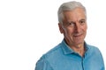 Close up of grizzled hair man wearing blue jeans shirt and smiling