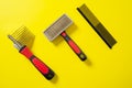 Close up grooming brush, special professional comb and furminator, for dogs and cats grooming Royalty Free Stock Photo
