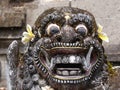 Close up of Balinese statue in Pura Sangara sea temple near Sanur, Bali