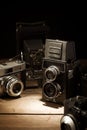 Close-up of a group of antique film cameras