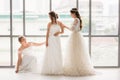 Group of beautiful brides arrange their dress Royalty Free Stock Photo