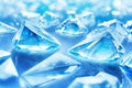 close up of a group of blue crystals on a blue ice background