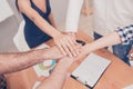 Close up of group of businesspeople putting their hands on top of each other Royalty Free Stock Photo