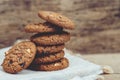 Close up of a group Chocolate chip cookies many stacked on apron sackcloth Royalty Free Stock Photo