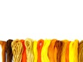 Group of colorful spools of sewing thread top view on white background Royalty Free Stock Photo