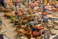 Close Up of Group of Demijohn Wrapped with Colored Cotton