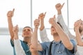 Close up. group of doctors showing thumbs up.