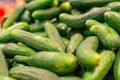 Close-up of a group of fresh green cucumbers. Organic vegetables cucumbers in the tray. Delicious cucumbers. You can use Royalty Free Stock Photo