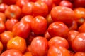 Close up group of fresh red tomatoes of organic vegetables at fresh market