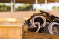 Close Up of a Group of Horsehoes in a Stable on Blur Background Royalty Free Stock Photo