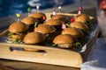 Close up of group of mini hamburgers Royalty Free Stock Photo