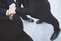 Close up of Group people of businessmen joining putting their hands together with stack of hands showing unity and teamwork. conce Royalty Free Stock Photo