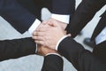 Close up of Group people of businessmen joining putting their hands together with stack of hands showing unity and teamwork. conce Royalty Free Stock Photo