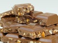 Close up of a group pieces of delicious brown chocolate with nuts
