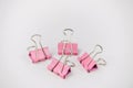 Close-up of a Group of Pink Bulldog Clips