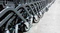 Close-up group of shopping cart wheels. selective focus. Royalty Free Stock Photo