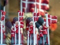 Close-up of a group of smiling toy Danish Soldiers in red uniforms