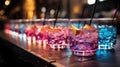 Close-up of group of stylish coloured cocktails with ice and lemon on the bar counter. Generative AI