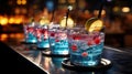 Close-up of group of stylish coloured cocktails with ice and lemon on the bar counter. Generative AI