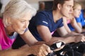 Close Up Of Group Taking Spin Class In Gym Royalty Free Stock Photo