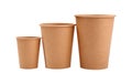 Three brown paper parchment coffee cups isolated