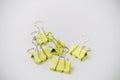 Close-up of a Group of Yellow Bulldog Clips