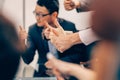 Close up. group of young business people showing thumbs up. Royalty Free Stock Photo