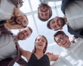 close up. group of young business people standing in a circle. Royalty Free Stock Photo