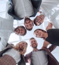 close up. group of young business people standing in a circle. Royalty Free Stock Photo