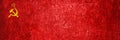 Close-up of the grunge flag of the Soviet Union. Dirty USSR flag on a metal surface Royalty Free Stock Photo