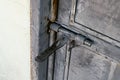 Close up:grunge metal old rusty door hinge,. Royalty Free Stock Photo