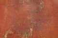 Grunge red painted plaster wall background Royalty Free Stock Photo