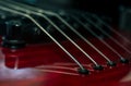 Close up with a guitar bridge and strings Royalty Free Stock Photo