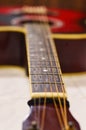 Close-up guitar fretboard with strings isolated. blur photo