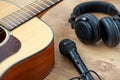 close up of guitar, microphone and headphones Royalty Free Stock Photo