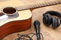 close up of guitar, microphone and headphones Royalty Free Stock Photo