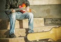 Close up of a guitar player in vintage tone Royalty Free Stock Photo